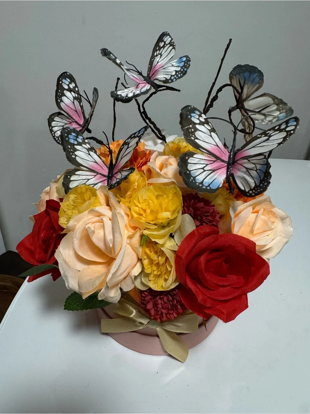 Elegant Pink Hatbox Floral Arrangement with Butterflies